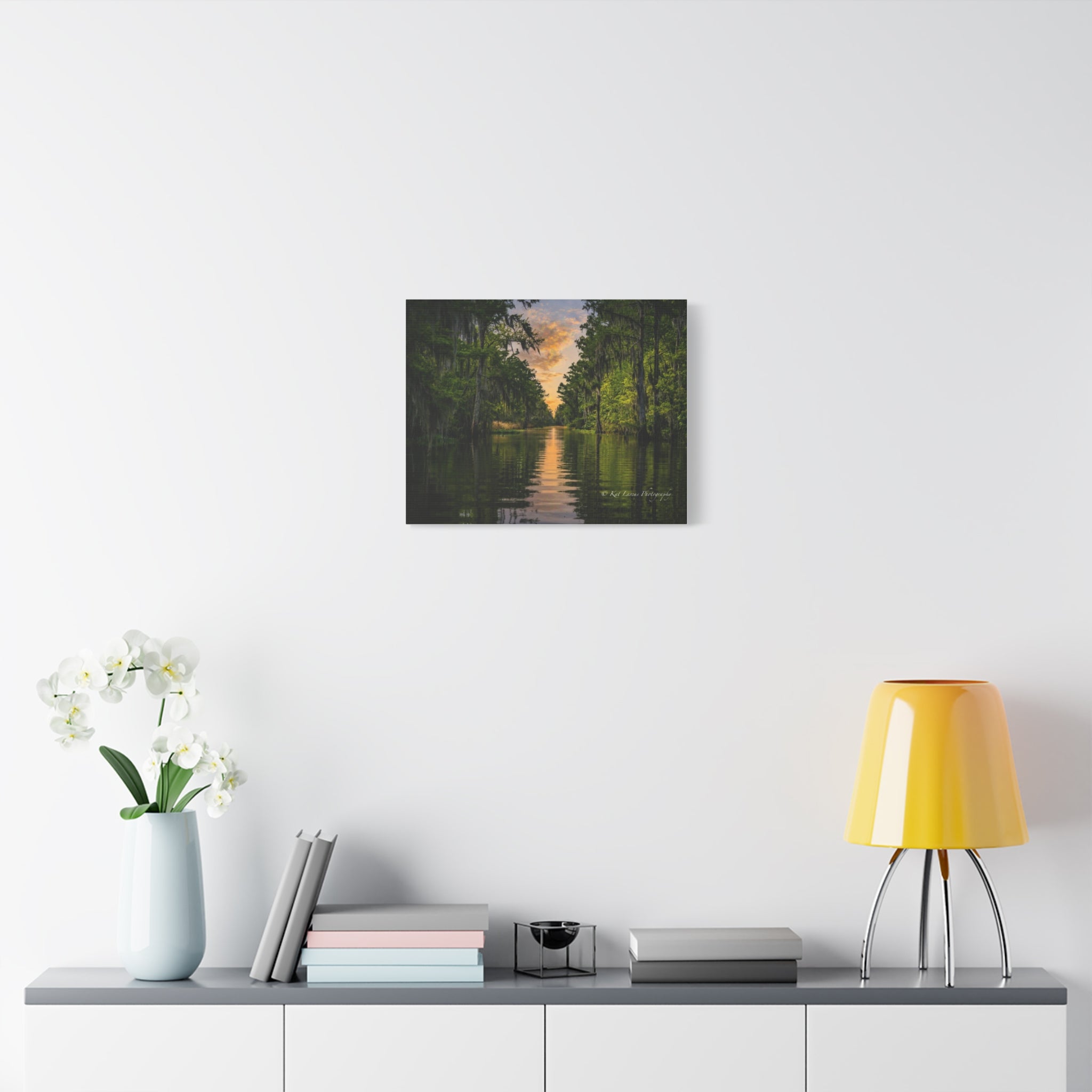 Louisiana cypress swamp sunset canvas wall art displayed in a bright interior.
