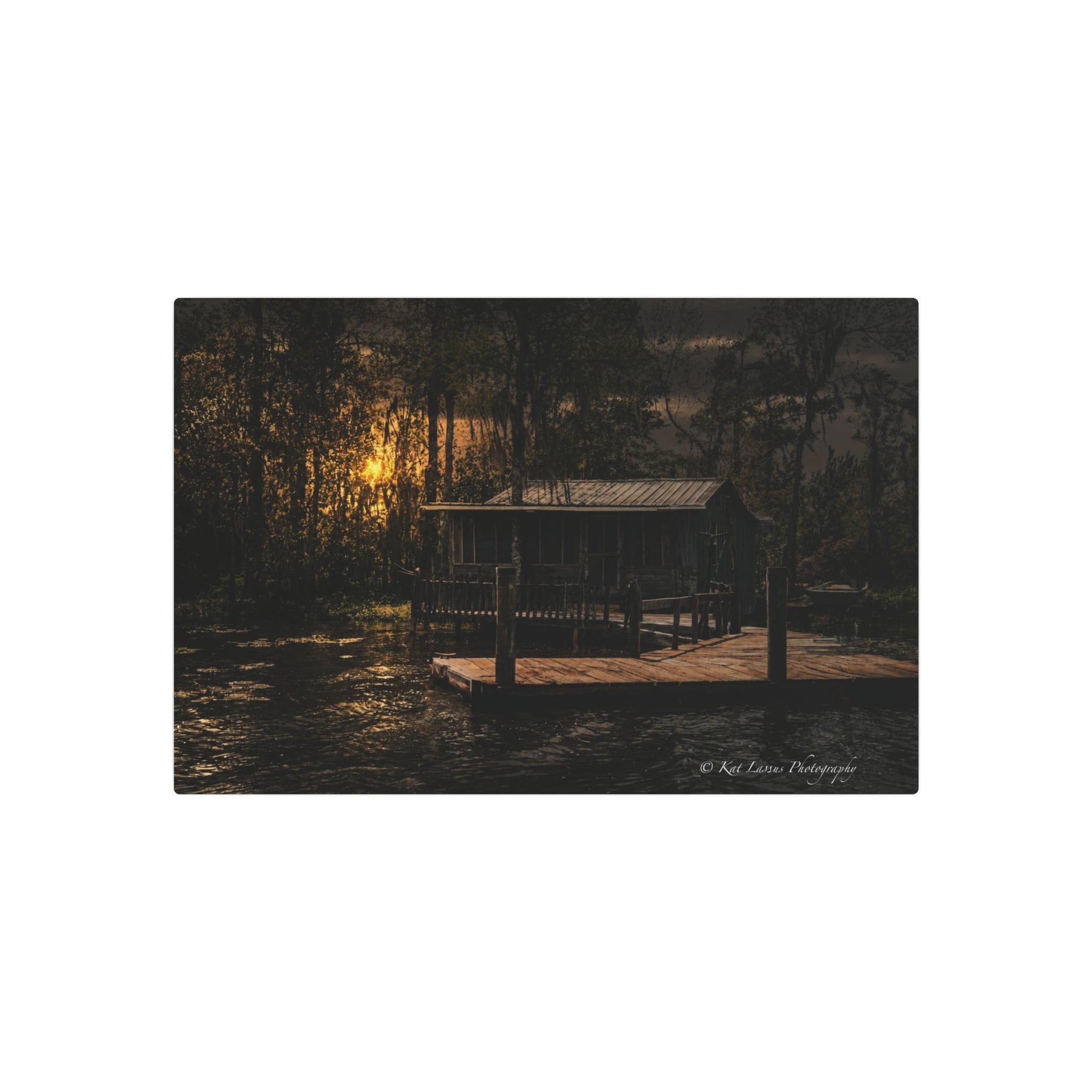 Last Light on the Bayou metal wall art featuring a Louisiana swamp cabin at sunset.