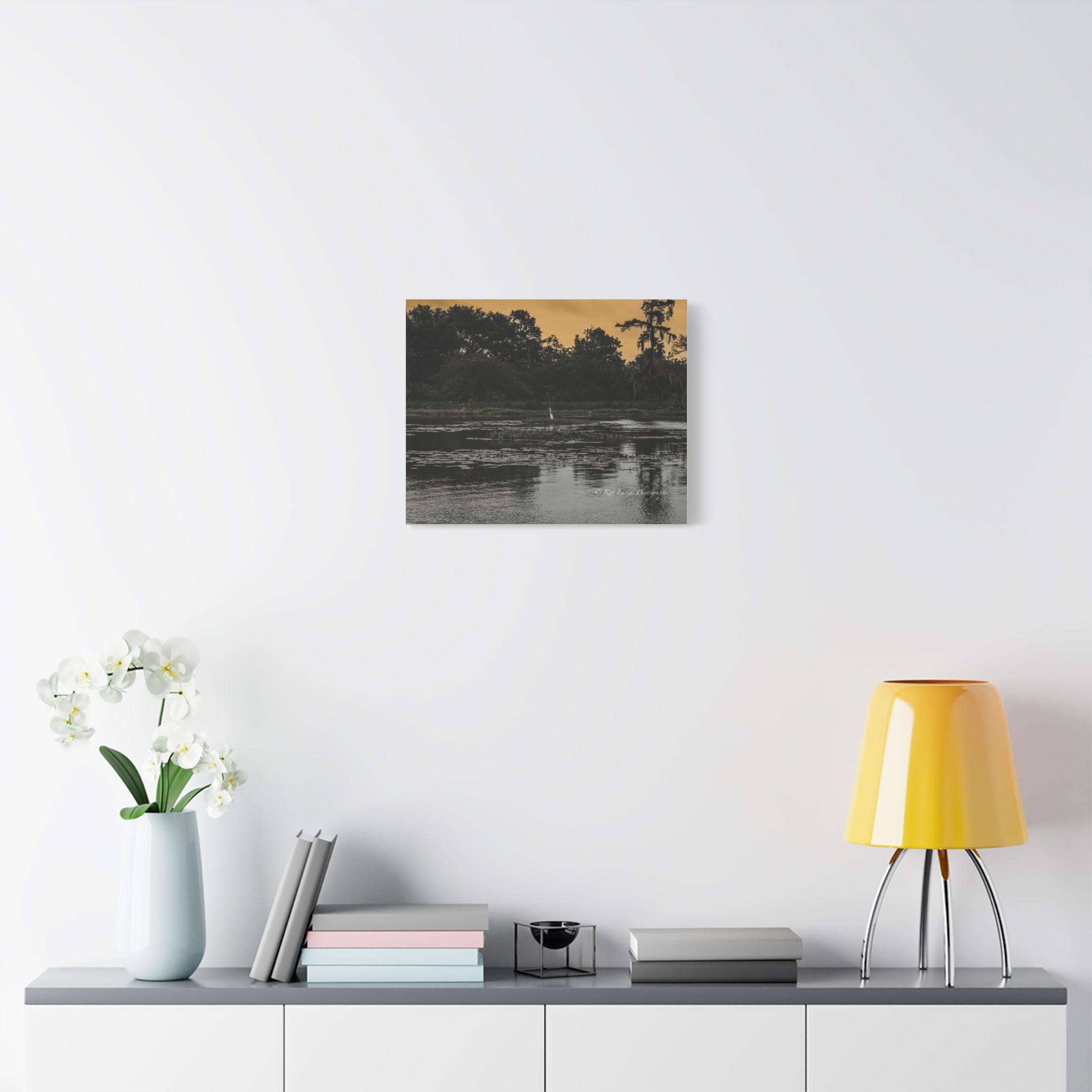Where the Heron Waits bayou canvas wall art displayed in a bright modern interior.