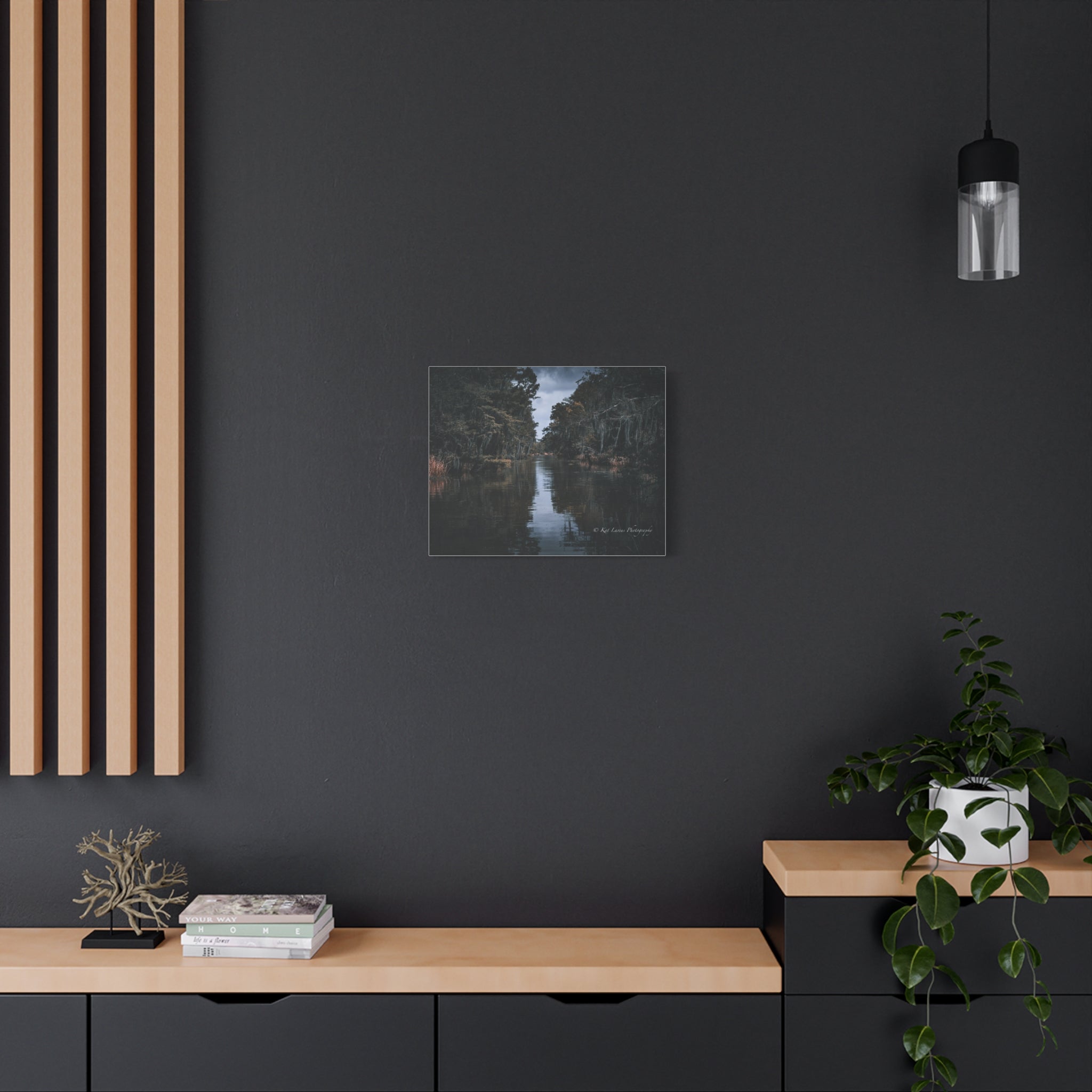 Veil of the Marsh moody Louisiana swamp canvas displayed on a dark interior wall.